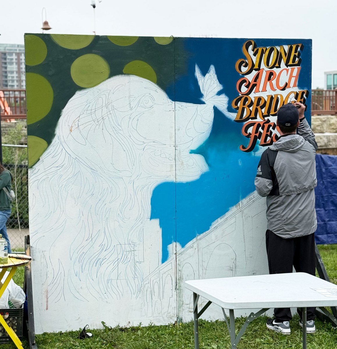 Stone-Arch-Bridge-Festival-live-painting-in-progress-dog